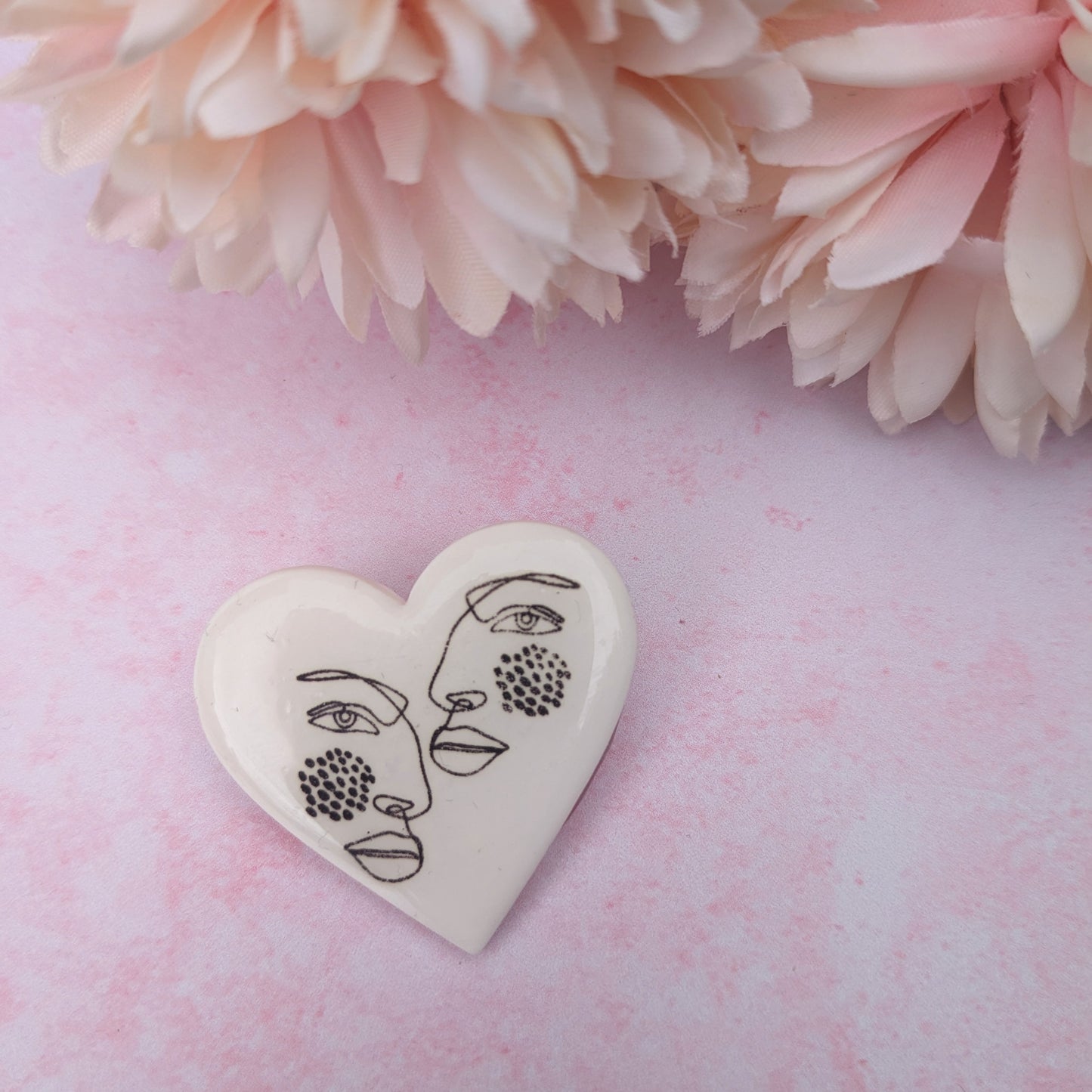 Two Faces Badge
